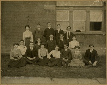 From "Beckley U.S.A." by Harlow Warren, p. 369, vol. 2. On back of portrait: "The Beckley contingent at Concord Normal ('College' now), Athens, W. Va. Front l. to r.: ____ Garten, Charley Garten, Jessie McGuire, Blanch Phillips, Thomas K. Young (well-known Presbyterian minister now), Sue Laing and (Dr.) Robert A. Ashworth (father of lawyers Robert and John Ashworth). Second row: (girl)____ Willis, George S. McKinney, Ken R. Callaway, Maud Martin (?), (Mrs. Jennings). Third row: ____ (McKinney, Judge J. W. Maxwell, John L. Hawley, Morris McGuire and George Daniels (retired, from railroading after 48 years service)."