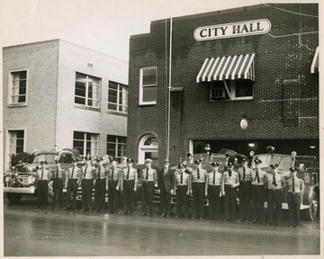 From "Beckley U.S.A." by Harlow Warren, p. 547, vol. 2. In book: "And, also with Beckley's 1962 Fire Department: Lined up in front of their first class fire, squad and rescue equipment, from left to right: Lieut. Frank Ubeda, Jr., Clifford L. Maynard, Allen Bonds, Jr., Robert L. Davis, Chester C. Clyburn, James McGinnis, Captain Otis Lyons, Chief Cecil P. Conner, Mayor Cecil L. Miller, Capt. Alvin F. Marion, Lieut. Albert R. Allen, Jr., Harvey H. Statzer, Harold F. Statzer, Alvin L. Wood, Robert L. Perdue, Leonard L. Lyons, and William H. Dew. Absent: James L. Lipscomb" (p. 547). 