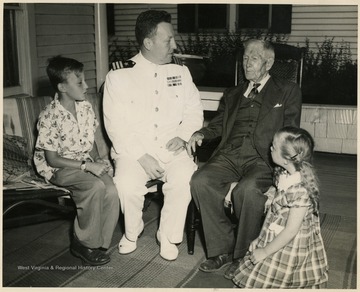 From "Beckley U.S.A." by Harlow Warren. On back of portrait: " Left to right: Steven Morris Archer, Jr. great grand child. Capt. Steven Morris Archer, son. Rev. T. H. Fitzgerald Archer, died January 16, 1952. Cynthia Archer, great grand daughter. Baptist Church."