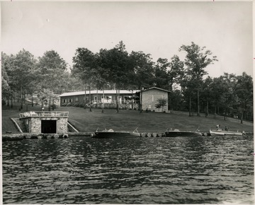 From "Beckley U.S.A." by Harlow Warren, p. 744, vol. 2. In book "The palatial Jess Richmond Home on Flat Top Lake" (p.744).