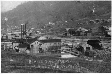 Laneville, with the Dry Fork Company mill in the foreground. Note the footbridge across Red Creek (at center of picture), connecting the mill with the town.