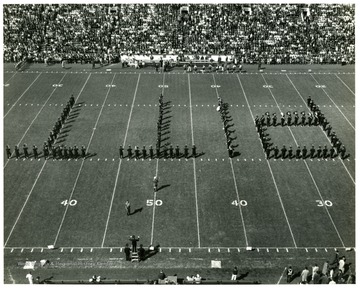 University of Pittsburgh spelling out "PITT" on field during pre-game show.