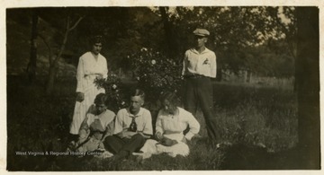 Left to right: Alma Ramsey, Anna Sutton Fischer, Geo. Fischer, Ida Sutton, Bill Sutton. Original returned to donor.