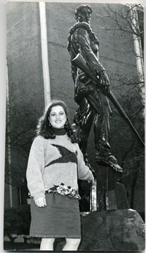 WVU's first female Mountaineer mascot. One of seven children raised on a family farm in Marion County and the second girl in her family to be her high school mascot, Natalie Tennant sees her role as WVU Mountaineer as part of a longstanding family legacy. In her public appearances, she reminder her audiences, "Our grandmothers and Great-grandmothers were Mountaineers way before I was."