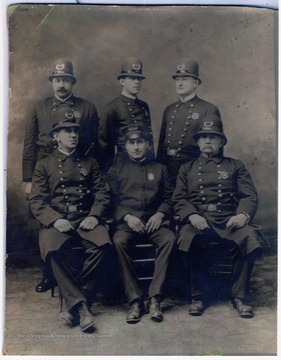 Tom Watkins, second row, center; John Yoke, first row, center; Chief of Police