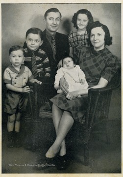 Mr. and Mrs. Loye D. Pack and Family. Joanne, 9; Gerry, 6; Donnie, 3; Paul, 2 months. Picture taken March 1st, 1941. Less than 1 week before Cowboy died in Cleveland Clinic Hospital.