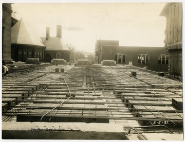 View of beam # 5 and floor panels showing additional reinforcement in beam and the concrete floor slab of vault lowered.