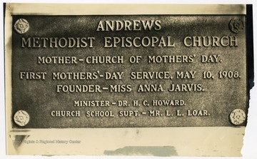 Bronze plaque placed at the entrance of Andrews Methodist Church in honor of the founder of Mother's Day, Miss Anna Jarvis.