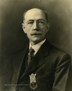 Braxton Davenport Gibson wearing a medal, possibly for a lodge officer 