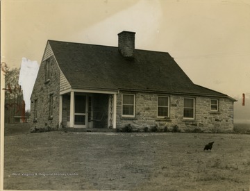 One of the 40 houses built from native stone in the Federal Home Project in Arthurdale, Preston County, West Virginia.