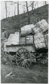 Weekly wagon load of beer bottles and barrels returning from South Sabraton. Listrava Avenue on deep, muddied road.