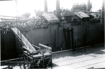 The "Sea Witch" sailed for America one hour before Major Elmer Prince's transport. Major Prince of Morgantown, West Virginia, probably took this photograph. Note the crowded deck, packed with GIs returning home.