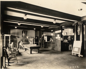 Note the solid wood ping-pong table in the center of the room.