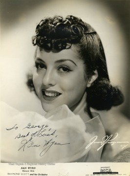 Nan Wynn from Wheeling, West Virginia (1915-1971), sang and recorded with several big bands in the 1930s and appeared in movies in the 1940s. She also dubbed Rita Hayworth's singing voice in such movies as "Cover Girl". This photograph was autographed by Nan Wynn for George Barrick Jr. while she was appearing in Morgantown, West Virginia at the Warner Theater on High Street with Raymond Scott and His Orchestra, July 18, 1940. She left Scott's band, September 13, 1940 to pursue a solo career.