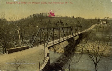 Post card color photograph of a steel structure bridge over the Opequon Creek close to the confluence with the Potomac River in Berkeley County.