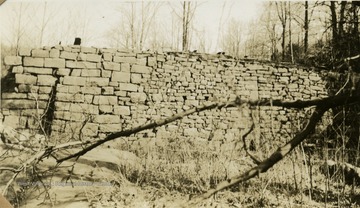 A dam for a flour mill, made out of split stone on Deckers Creek, near Pioneers Rocks in Monongalia County.