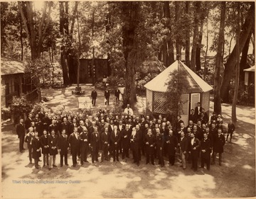 Martinsburg, West Virginia native David Hunter Strother was appointed Consul to Mexico by President Rutherford B. Hayes in 1879. The photograph was taken in the gardens called Tivoli De San Cosme at Espiritu Santo, Mexico. Strother is front and center with the white, flowing beard.  