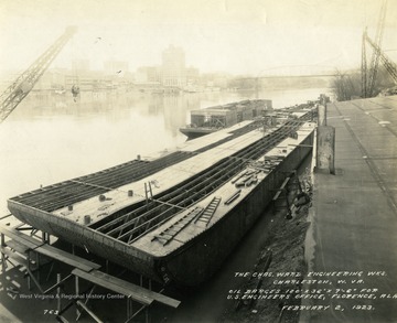 Oil barges being built by the Charles Ward Engineering Works in Charleston, West Virginia.
