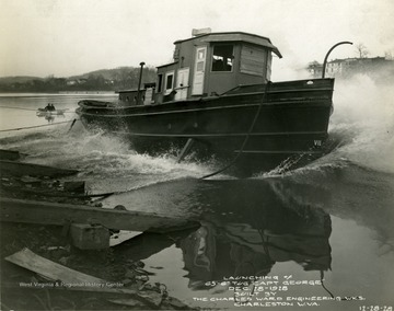 Launching of the tugboat, "Captain George" built by The Charles Ward Engineering Works in Charleston, West Virginia.