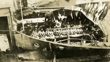 Damaged towboat after wrecking. Towboat built by The Charles Ward Engineering Works in Charleston, West Virginia.