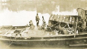 Damaged towboat after wrecking. Towboat built by The Charles Ward Engineering Works in Charleston, West Virginia.