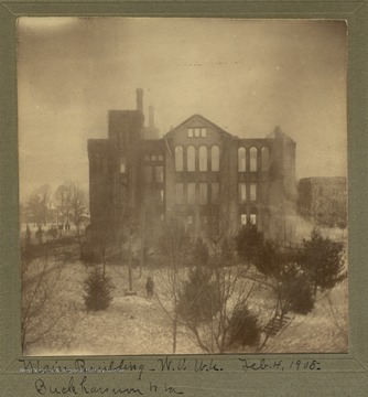 Only the outside walls of the main building of the West Virginia Conference Seminary (later West Virginia Wesleyan College) remain after a fire.