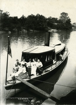 Charles Ward and family on Madge Yacht built by The Charles Ward Engineering Works in Charleston, West Virginia.