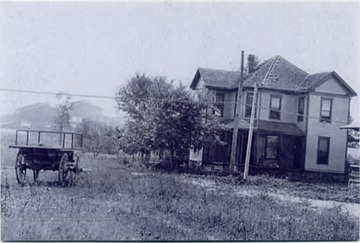 Frank Henry was a glass worker for Banner Glass Company. His home was located on the corner of Third and E Streets. The Armory can be seen in the background.