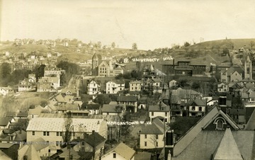 Postcard photograph of Morgantown in the foreground and the West Virginia University campus in the background including University Hill, also known as "Observatory Hill". See the original for correspondence written on the back.