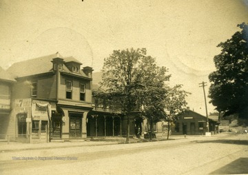 Postcard photograph of businesses and possibly the Railroad Depot(far right) in St. Marys, West Virginia. See the original for the correspondence written on the front.
