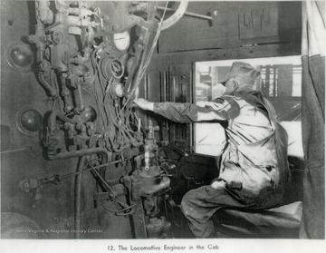 Unidentified engineer sits at the controls of a locomotive of probably a Chesapeake and Ohio train, looking out the window, down the track. Information on the back includes, "Stephen D. Trail Su. Co. W. V. 2000 From Roy Long Collection".