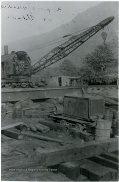 Originally operated by the Glade Creek Coal and Lumber Company, the 750 foot railroad bridge was salvaged by the Chesapeake and Ohio railroad during World War II. Information on the back of photograph includes: " Stephen D. Trail Su. Co. W. V. 2000; Roy Long Coll."