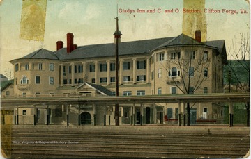 Color postcard of the Chesapeake and Ohio Depot and the Gladys Inn. The Inn was taken over by the YMCA in 1930.