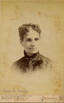 A cabinet card portrait of Mrs. J. Engle, possibly the wife of Reverend J. Engle.