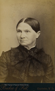 A cabinet card portrait of an older woman identified as " _?_ Young Martin", possibly a member of the Young family of Charleston, West Virginia.