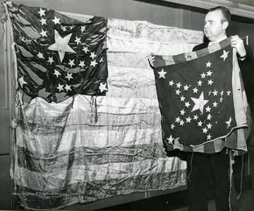 American flags followed into several battles, including Gettysburg and Petersburg, by the 12th West Virginia Regiment during the Civil War. Each flag has 35 stars, the 35th star is for the new state of West Virginia.