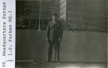 Corporal Carpenter, in uniform standing outside the U. S. Headquarters in Frankfurt, Germany, post-World War II.