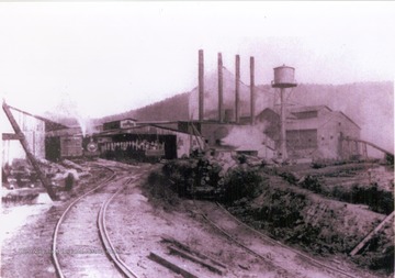 View of the company's lumber mill and rail transportation. Information on the back of the photograph includes: "Stephen D. Trail Su. Co. W. V. 2000 Roy Long Coll".