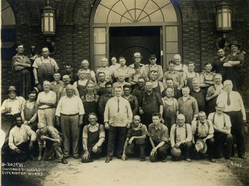 Group portrait of the Division Street Group City Water Works, probably in Hinton, West Virginia. No one in the photograph identified. This photograph was purchased by Stephen Trail in Hinton, West Virginia. 