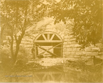 The molds hold the shape of a culvert during the construction of the Ohio extension of the Norfolk &amp; Western Railroad.