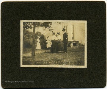 Photograph of a group of unidentified persons at Centerville Church. It was a Presbyterian church located in Monroe County. 