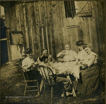 Inscribed on the photograph is "Left to Right M. DeGrant, B. McCormick, Clara McCormick, Eff McCormick, and Mrs. McCormick." The sixth person in the photograph is unidentified. 