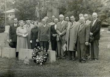 Members of the "Sons of the Revolution" and "Daughters of the American Revolution" at the grave of Thomas Dille in Oak Grove Cemetery. Left to right: Dr. M.E. Brown, Mrs. John A. Graham, Mrs. Rudolph S. Stoyer, Mrs. Floyd B. Cox, Mr. C.L. Strum, Mrs. J.L. Tritchler,Mr. J.C. Cotrel, Mr. Elisha Dille, Mr. Max Mathers, Mr. Virgil Brown, Mr. Floyd B. Cox, Dr. E.B. Tucker, Jr., Mr. Charles B. Morris, Mr. Jesse M. Jaco, Mr. Charles Minor.