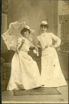 Anna M. Mathers (wife of Max Mathers, right) and Lucy Malhy (left). 0