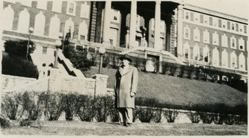 Unidentified male student poses outside of Women's Hall (Stalnaker Hall).