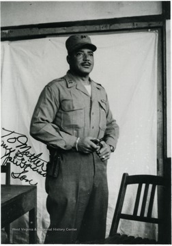 Colonel Ed Jones in uniform. Written on the photo: "To Mother my Princess, Your Son." Information on p. 143 in "Our Monongalia" by Connie Park Rice. Information with the photograph includes "Courtesy of Jack Ward Jr.".