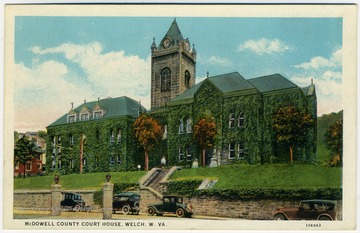 Postcard color photograph of the vine covered court house in Welch.