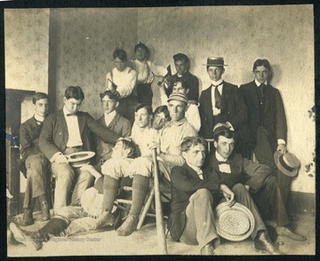 Unidentified WVU students, some in a comical pose and one wearing a baseball uniform.  