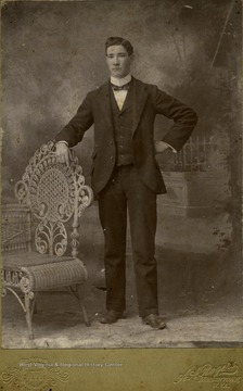 Unidentified WVU male student poses in a studio setting.