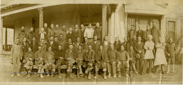 Bottom Row, L to R: Leslie Bucklew, Charles Price, James Larence, Ross Hawkins, J. C. Knight, George Lowe, Otis Pugh, Ira Bates, Jacob Swick, W. D. Tennant, Creed Maxwell. Middle Row: M. L. Perkins, Edgar Corley, W. R. Perkins, Grover Moats, J. R. Constable, G. W. Roy, Thelbert Titchnor, Charles Titchner, William Bosley, Thomas Pritchard, A. R. Forman, H. W. Eby, Frank Anderson, Smith Tanner, John Rosco, B. B. Luzier, H. L. Shultz, David Wilkins. Top Row: Harry Miller, Ambrose Brotherton, Jennings Barnes, B. F. McMahon, A. R. Wolf, Nick Luzier, Russell Whipkey, Thomas Lay, Bushrod Grimes (In charge of the project), A. O. Goldstrom, Leroy Work, M. R. Sisler, Francis Kerns, Chester Carlin, Arthur Rowan, Earl Whytsell.